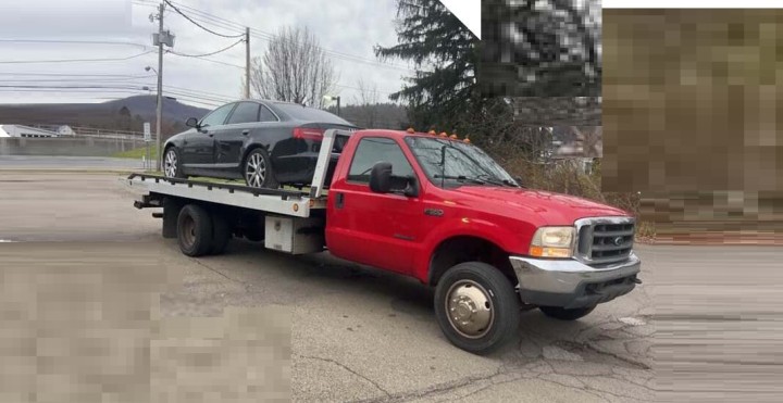 Ford F550 Super Duty Rollback Tow Truck