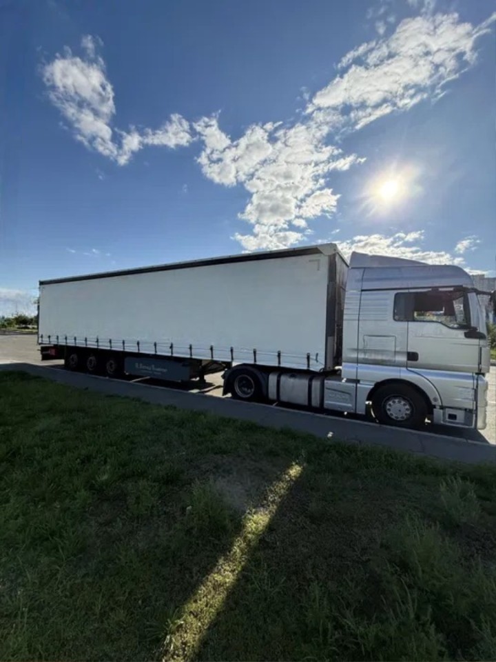 Полный автопоезд MAN TGX 18.440 Евро-6 с полуприцепом SCHMITZ