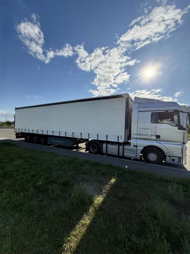 Повний автопоїзд MAN TGX 18.440 Євро-6 з напівпричепом SCHMITZ - Зображення 1 із 1